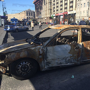 A burnt out car on Independence Square
