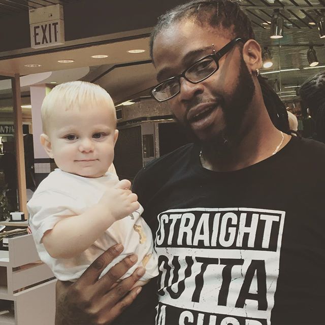 Instagram: E with his new barber, Paris. #firstrealhaircut