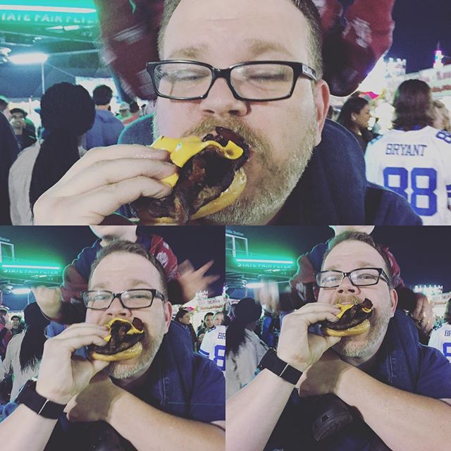 Instagram: David eating part of a Krispy Kreme doughnut bacon cheese burger. #ncstatefair